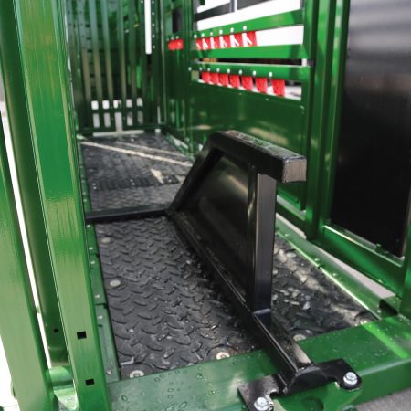 The brisket bar placed inside a Q-Power 107 Series hydraulic cattle crush